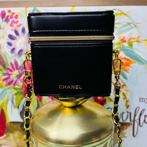 CHANEL Black Vegan Leather Case with Gold Zipper Crossbody Strap and Pearl Charm